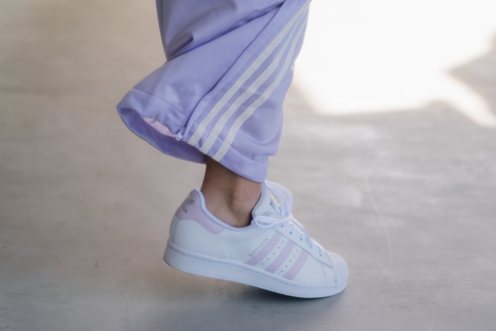 Women's adidas Superstar and track pants in light blue