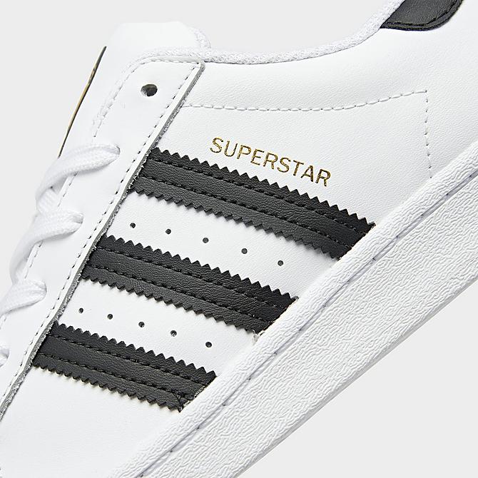 white adidas superstar left profile shot